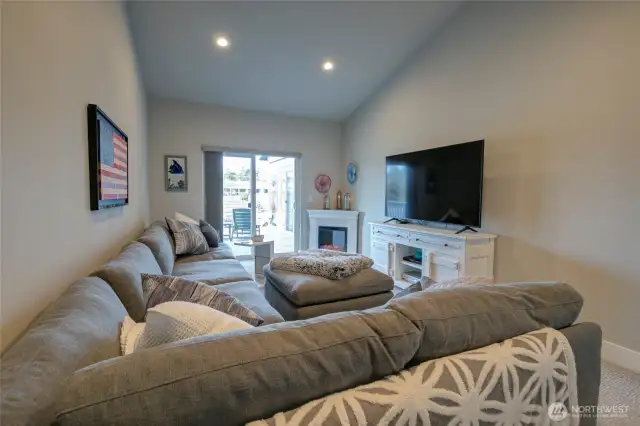 Main floor suite is currently used as a secondary family room.  It leads out to the rear deck overlooking the canal, as well as has a large closet and en-suite bath.  Would be a perfect main floor primary bedroom if desired!