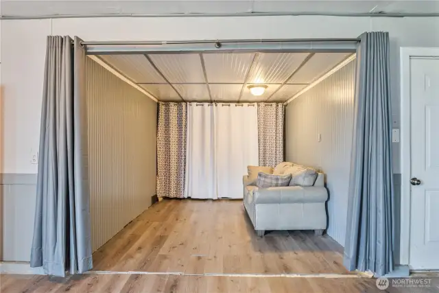 Could be storage or bedroom area