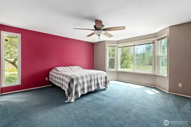 Primary bedroom with bay window