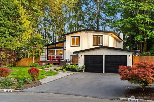 Welcome Home! Beautifully updated modern tri-level home with mature landscaping