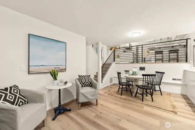 Open bonus room to lower bedroom/office, 1/2 bath, laundry and garage.