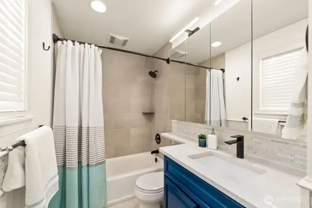 Beautifully updated en-suite bathroom modern finishes