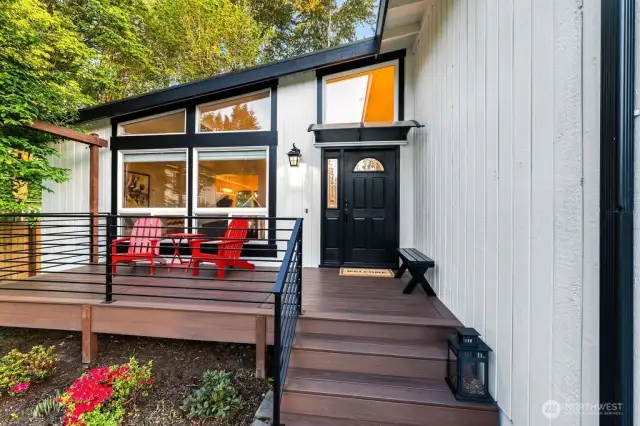 Front entry with Trex decking and modern railing.