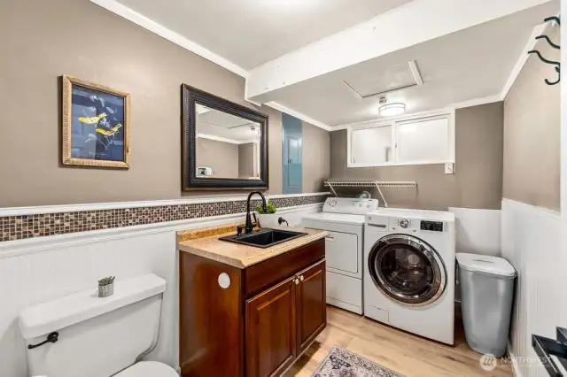 Lower level half bath and laundry room