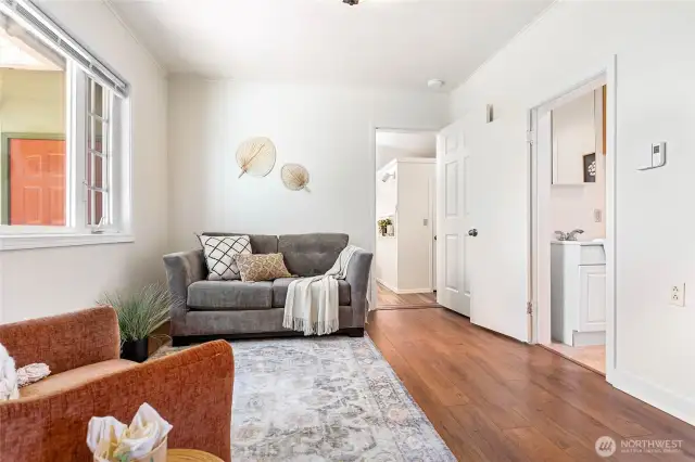 Super cute and cozy living room, or easily transform it into a bedroom with a nearby closet and bathroom.