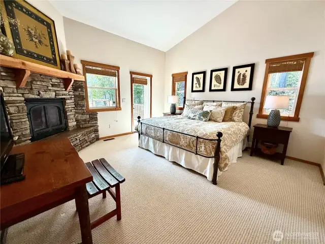 Primary bedroom w/ separate entrance to deck.