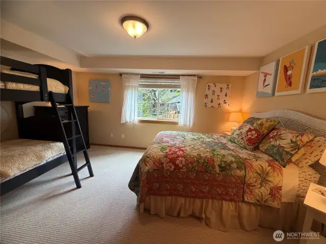 Extra large bedroom/bonus room  downstairs w/ French doors.