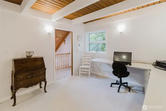 This currently is being used as an office, but has a closet and would be a good bedroom on the main with the 3/4 bath and laundry to create another ensuite.