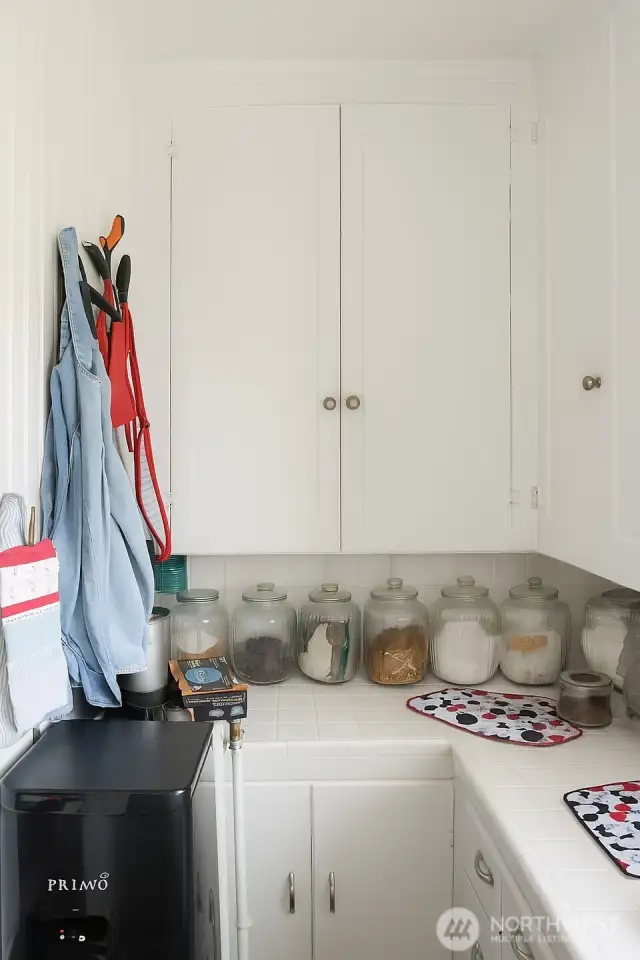 Walk in pantry. Nice area to meal prep or keep things nice and tidy.