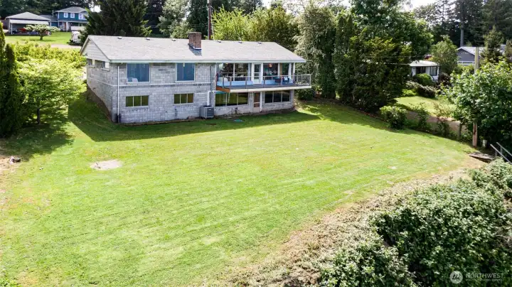 Large waterside yard ready for summer fun