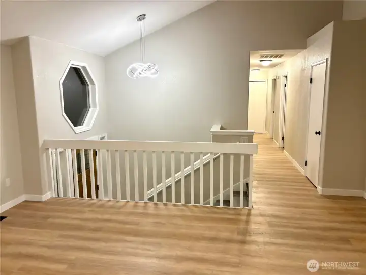 Main floor view of front entry and hallway.