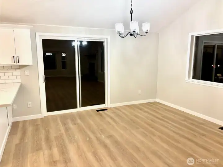 Dining area goes out to deck/backyard.