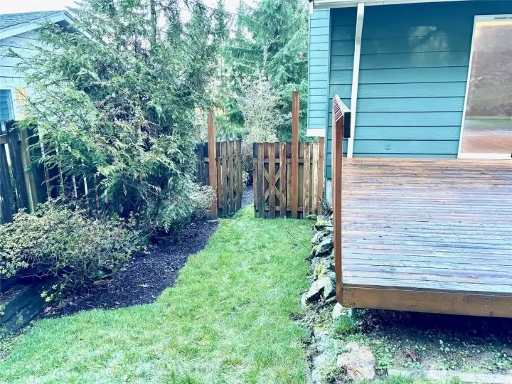 Right side of home from backyard POV.