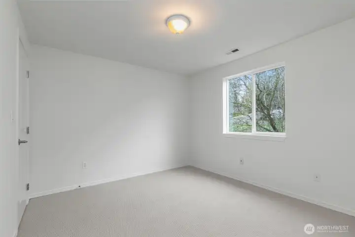Bedroom #4 on the upper level - this room has an additional walk-in closet.