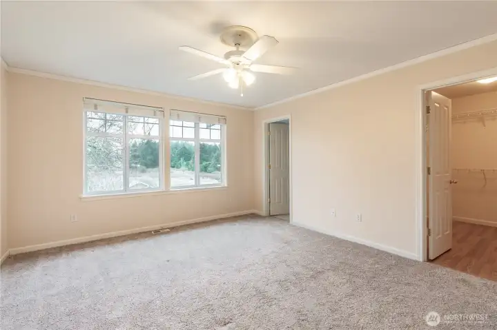 Primary bedroom with 5pc bath and large walk-in closet.