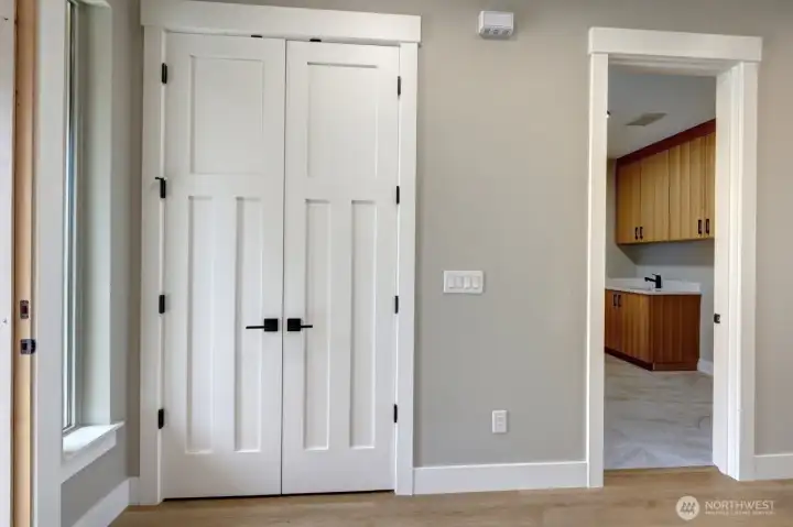 Large closet in entry and utility room, w/access to garage
