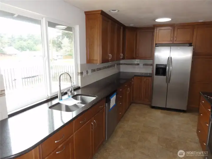 Huge kitchen with plenty of cabinets and counterspace. Huge kitchen with plenty of cabinets and counterspace.