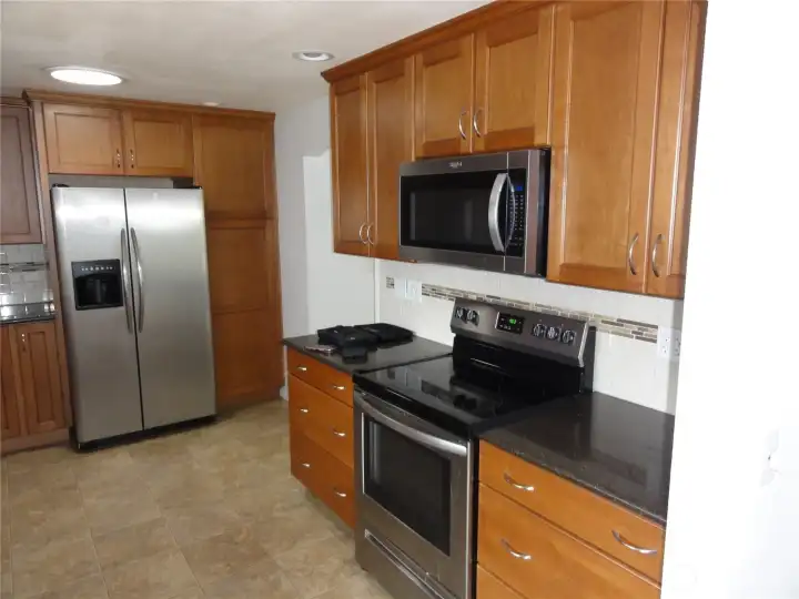 More of the kitchen. More of the kitchen.