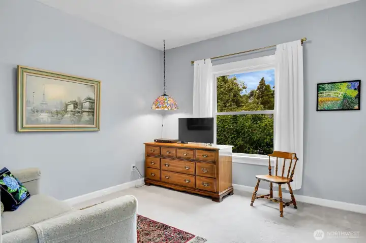 The second main level bedroom overlooks the back yard