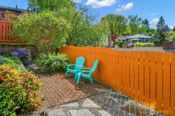 Back patio with terraced gardens on the west side of the home