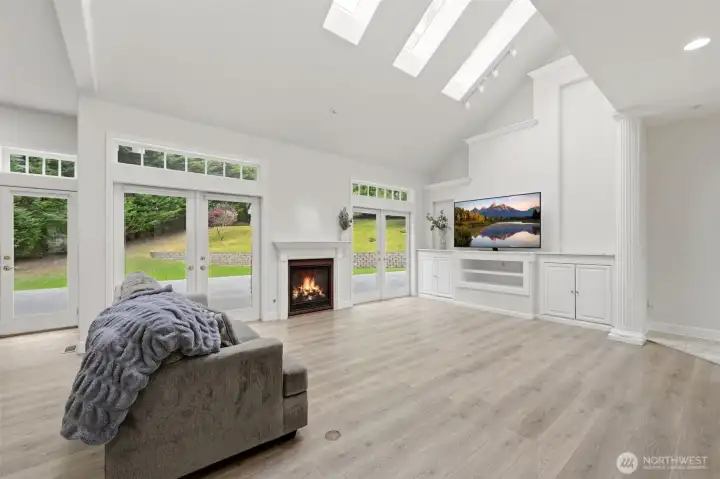 Living room showcasing the skylights and vaulted ceiling Living room showcasing the skylights and vaulted ceiling