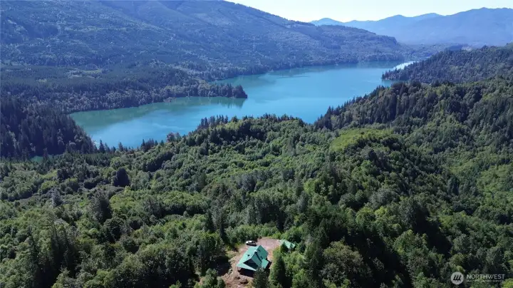 Panarmic Mountain and lake views from atop cleared cabin site.