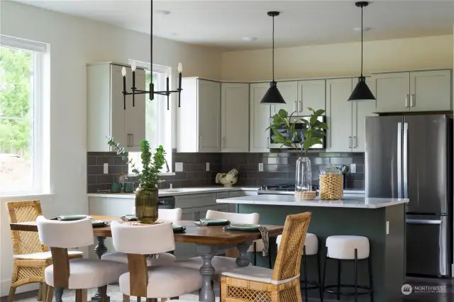 The gas range/oven, refrigerator, instant hot water tap and window coverings are standard features in the Magnolia Plan.