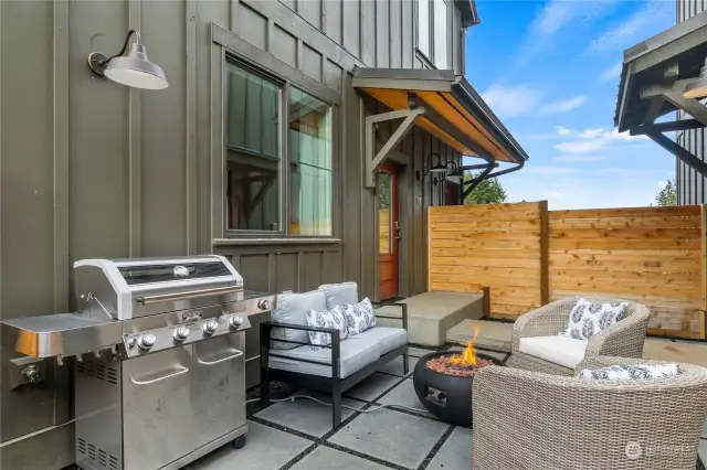 Enjoy quiet relaxation in the private, no maintenance Courtyard, situated between your home and the Garage. This space features gravel & pavers for flexibility in use and a gas tap for convenient grilling or personal firepit. “Right Sized”, 22’ wide 2-Car Garage is to the right.