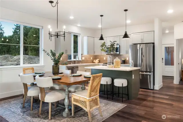 All Design Packages include stunning quartz counters with full tile backsplash, luxury vinyl plank flooring & striking contemporary lighting & hardware. Note the eat-in island, contrasting upper & lower cabinetry colors, under cabinet lighting and large energy efficient windows.