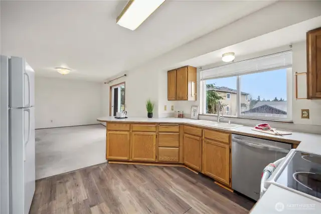 Kitchen offers a lot of counterspace and cabinets - even a large pantry cabinet.