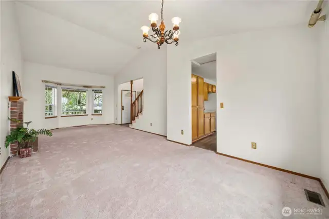 Showing the layout into the kitchen, while standing in the dining area.