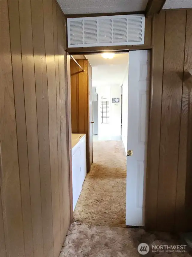 From the main, you can see the pocket door to the hallway.