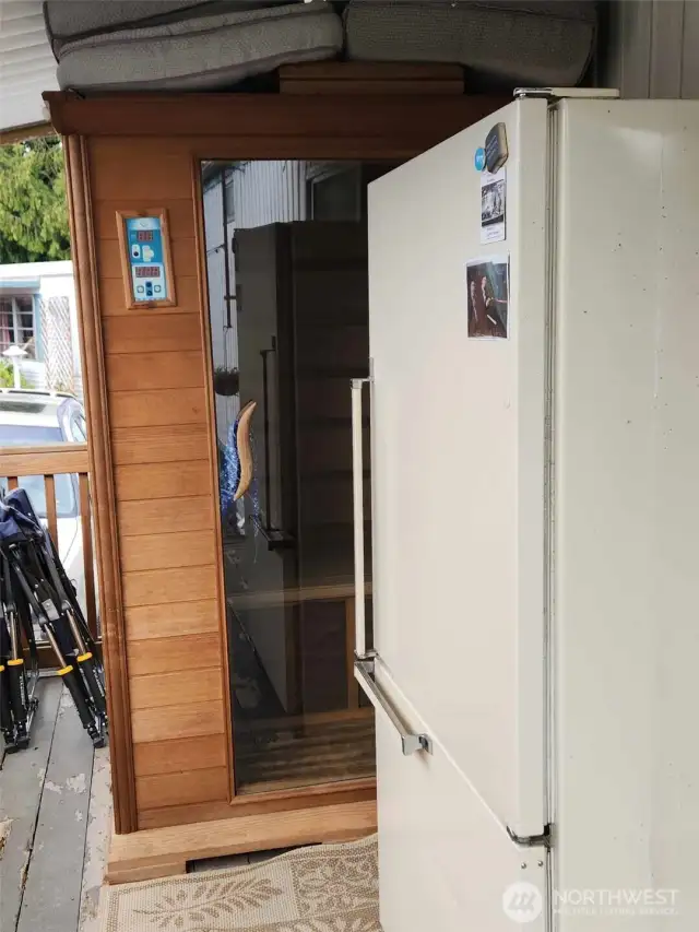 On the deck, there is a 2nd refrigerator that stays if you want it. The sauna does NOT convey.