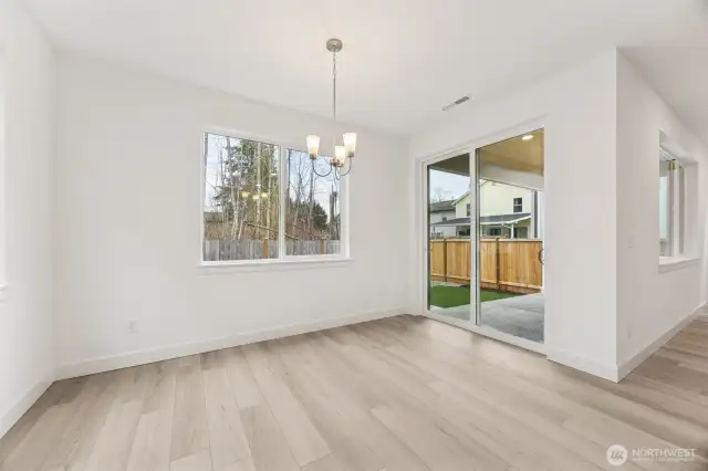 Dining room looking out back and covered patio