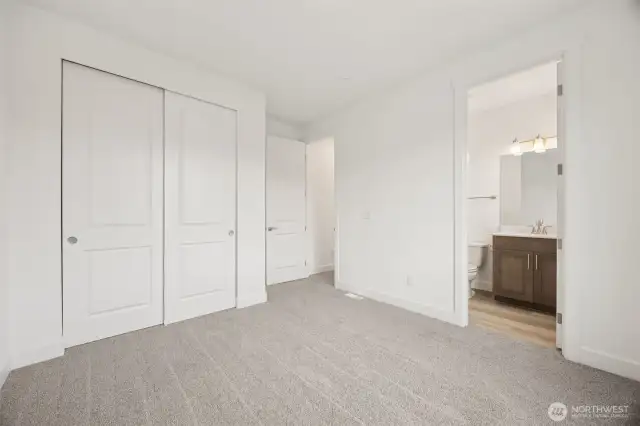 Upstairs secondary bedroom with full bath