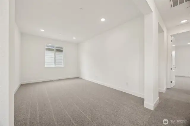 Large loft looking in from upstairs hallway