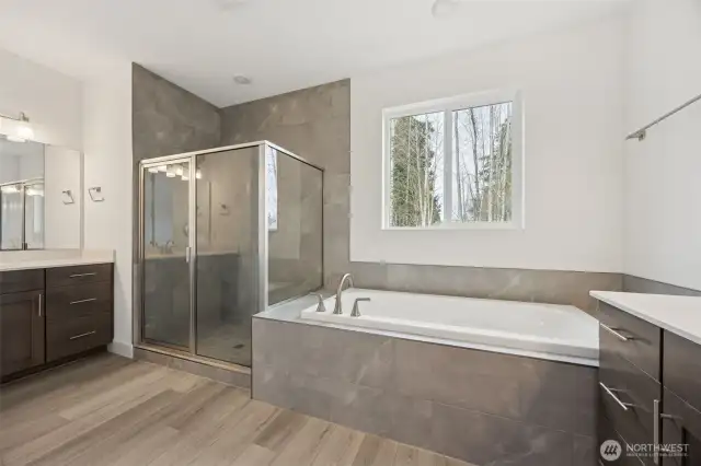 Deluxe Primary bath with large soaking tub walk in shower and two separate vanities