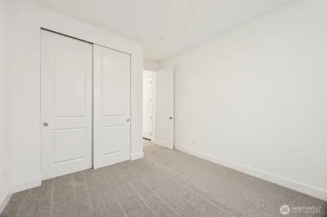 Main floor bedroom next to bathroom