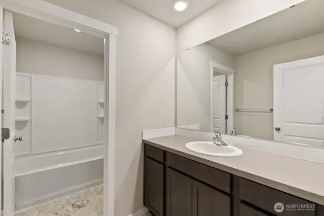 Hall bathroom on upper level; Colors, finishes, and options will vary.