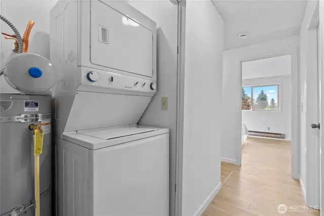 Stackable washer and dryer in your and brand new hot water tank.