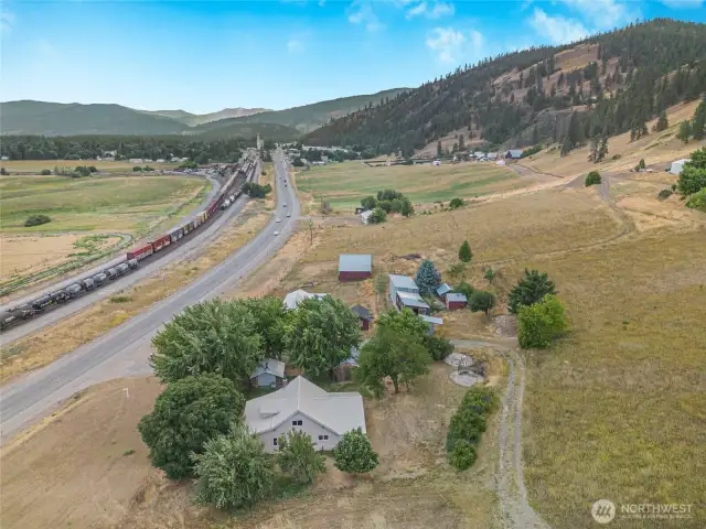 Aerial view of home and valley looking north