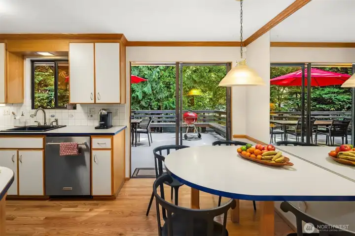 An amazing deck is waiting through the sliding door.