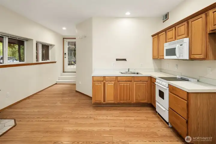 ADU: Large and open with high ceilings, line of windows and direct access to backyard.