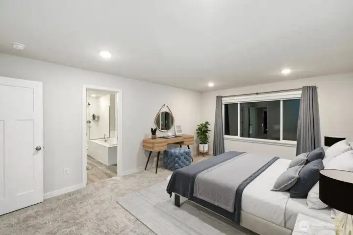 Master Bedroom with deluxe 5 piece master bath and a huge walk in closet!