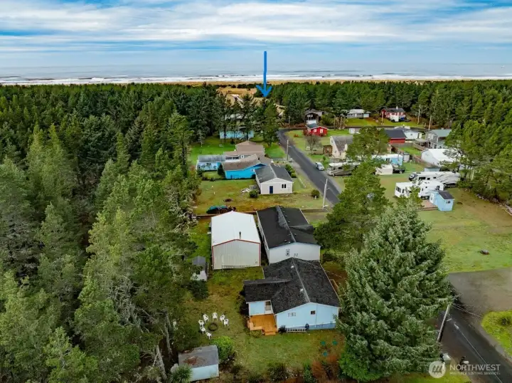Arrow shows where the beach path starts