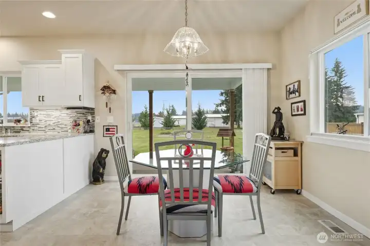 Eat in kitchen space- seller replaced the lighting above the table.  Choose one to match your own style.