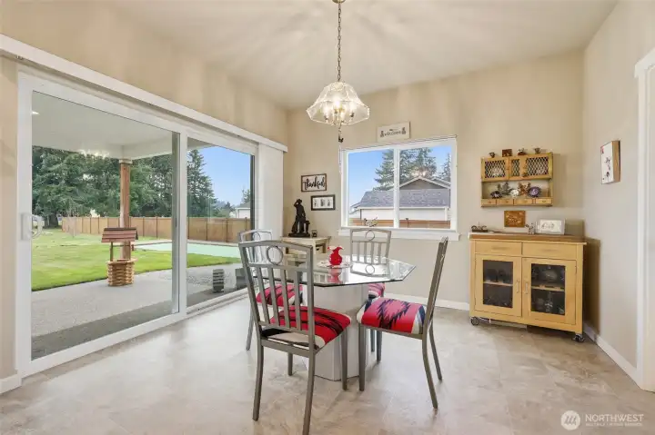 Windows on the end of the kitchen space too- plenty of natural light!