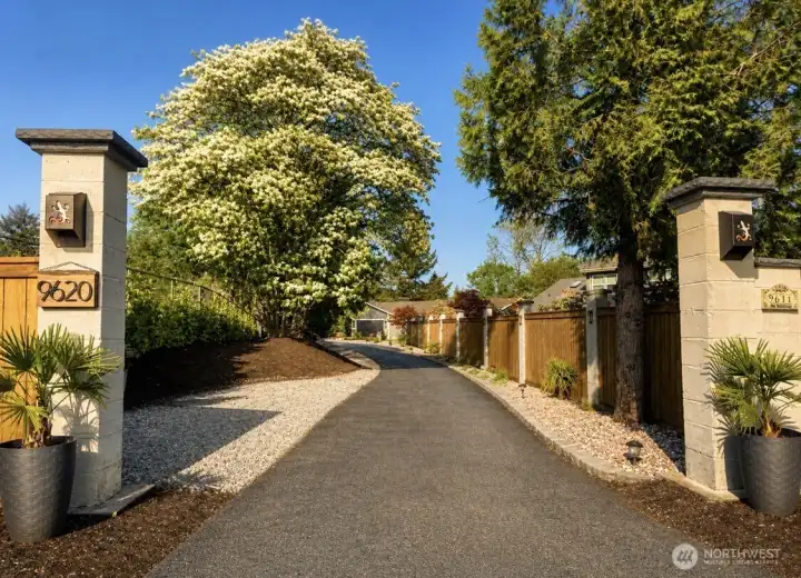 Arrive in style-Private, gated entry welcomes you into 1.1 acres of serene waterfront living on Carp Lake. Arrive in style-Private, gated entry welcomes you into 1.1 acres of serene waterfront living on Carp Lake.