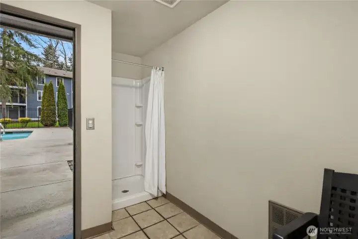 This door is the entrance to the clubhouse restroom and shower, with access to the pool.