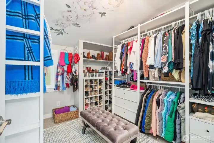 Secondary bedroom upstairs, set up as a great walk-in closet
